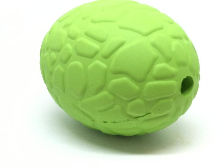 Green rubber Dinosaur Egg treat dispenser, alternate view of the scaled texture