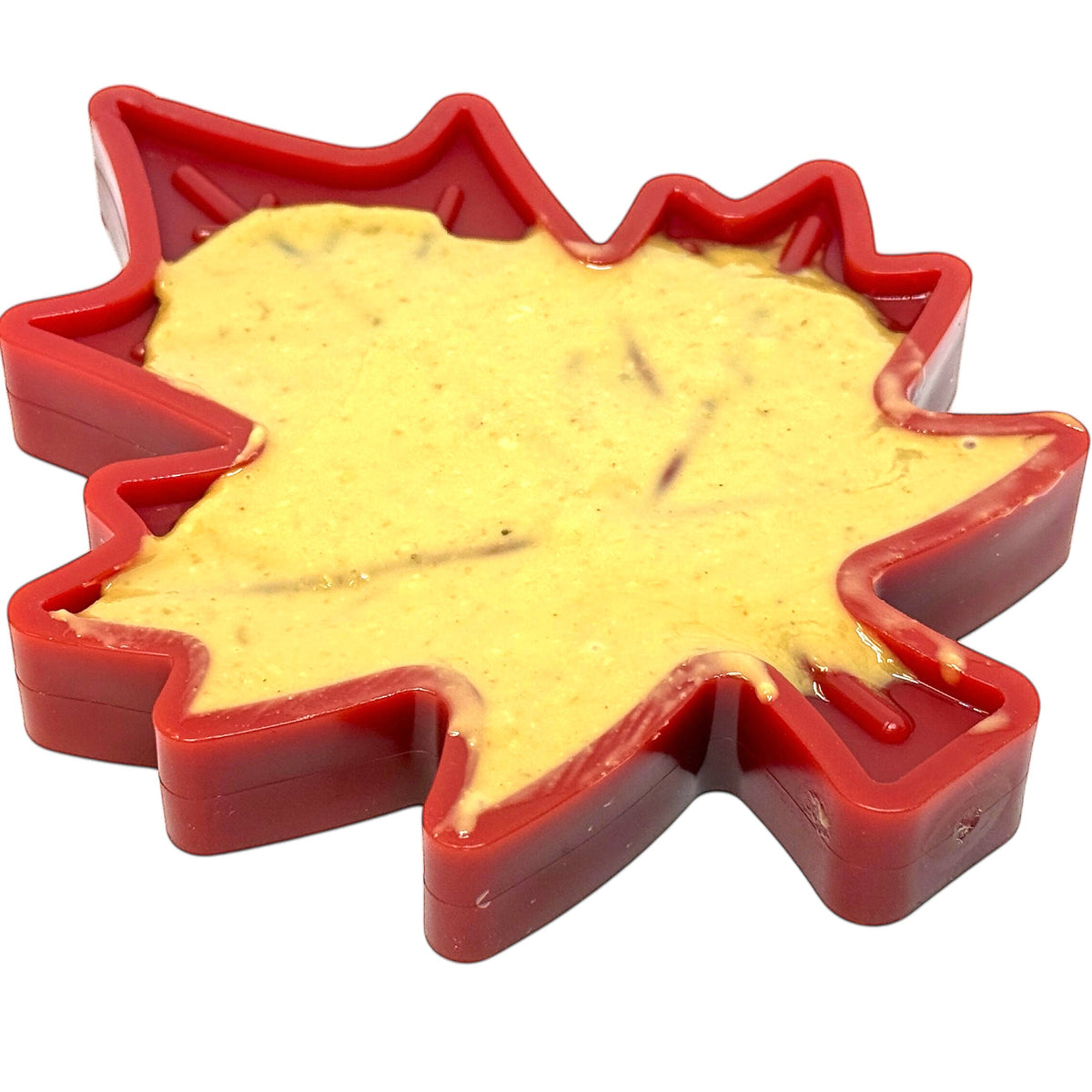 SodaPup Canadian Maple Leaf nylon toy with a spreadable treat smeared across the leaf
