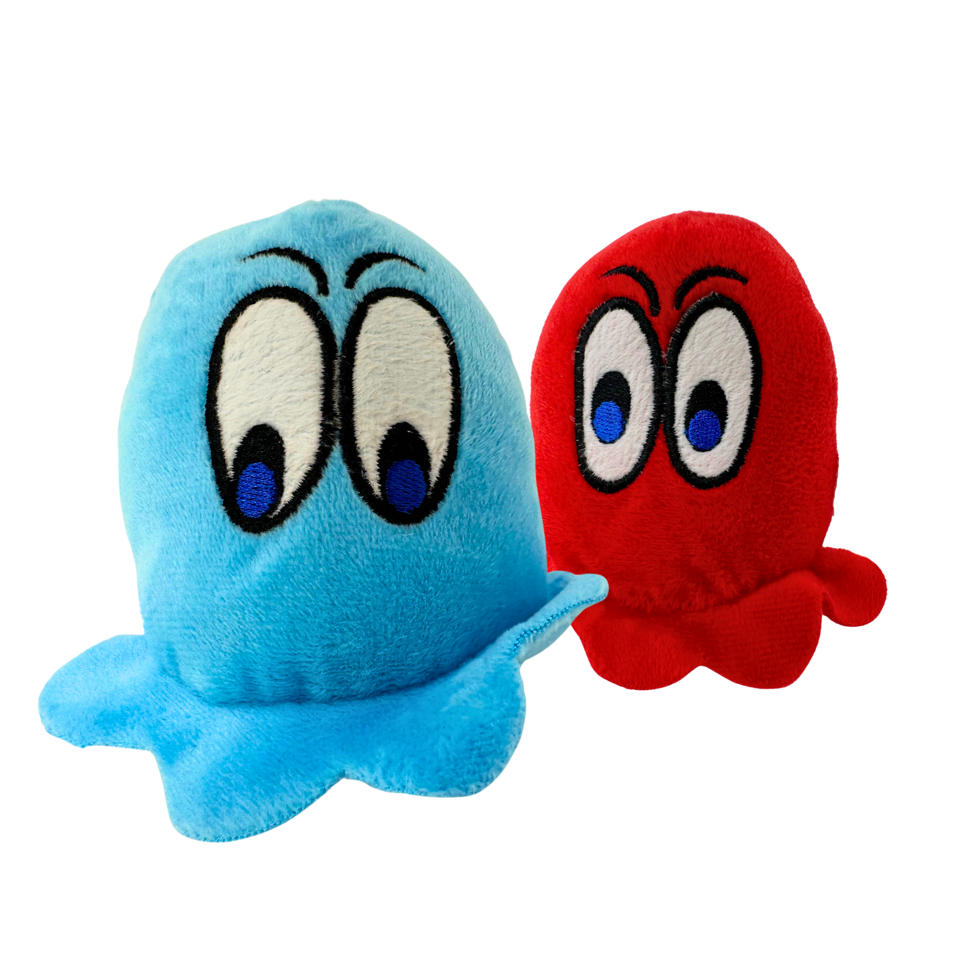 Plush dog toys in blue and red with expressive cartoon eyes