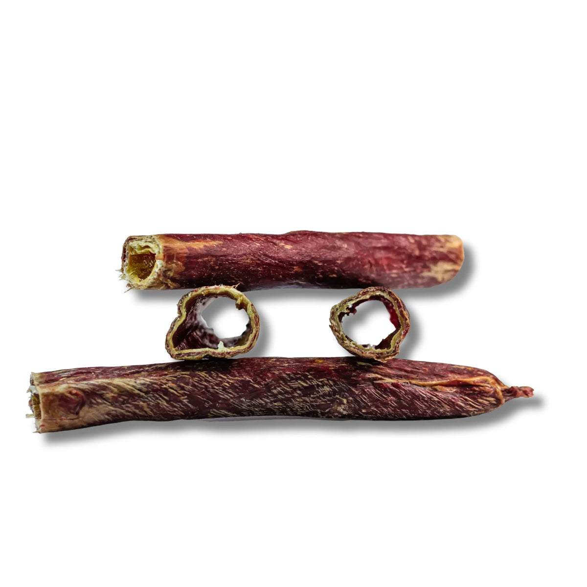 Two beef esophagus dog chews with sliced rings showing the hollow centre on a white background