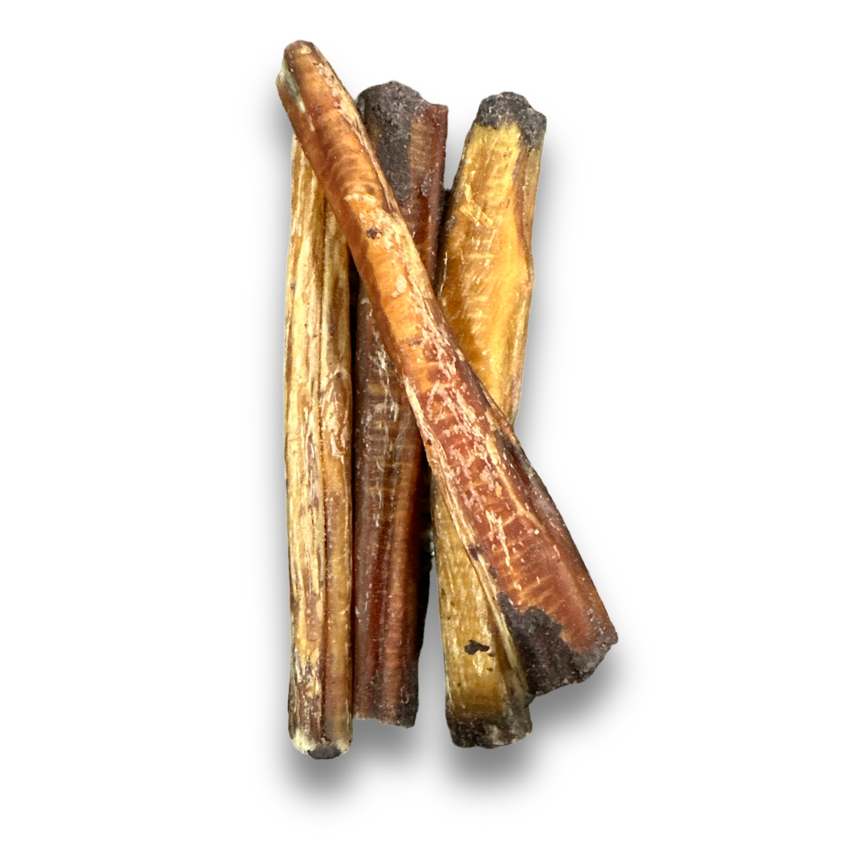 Bully sticks with blueberry-stuffed ends standing upright on a white background