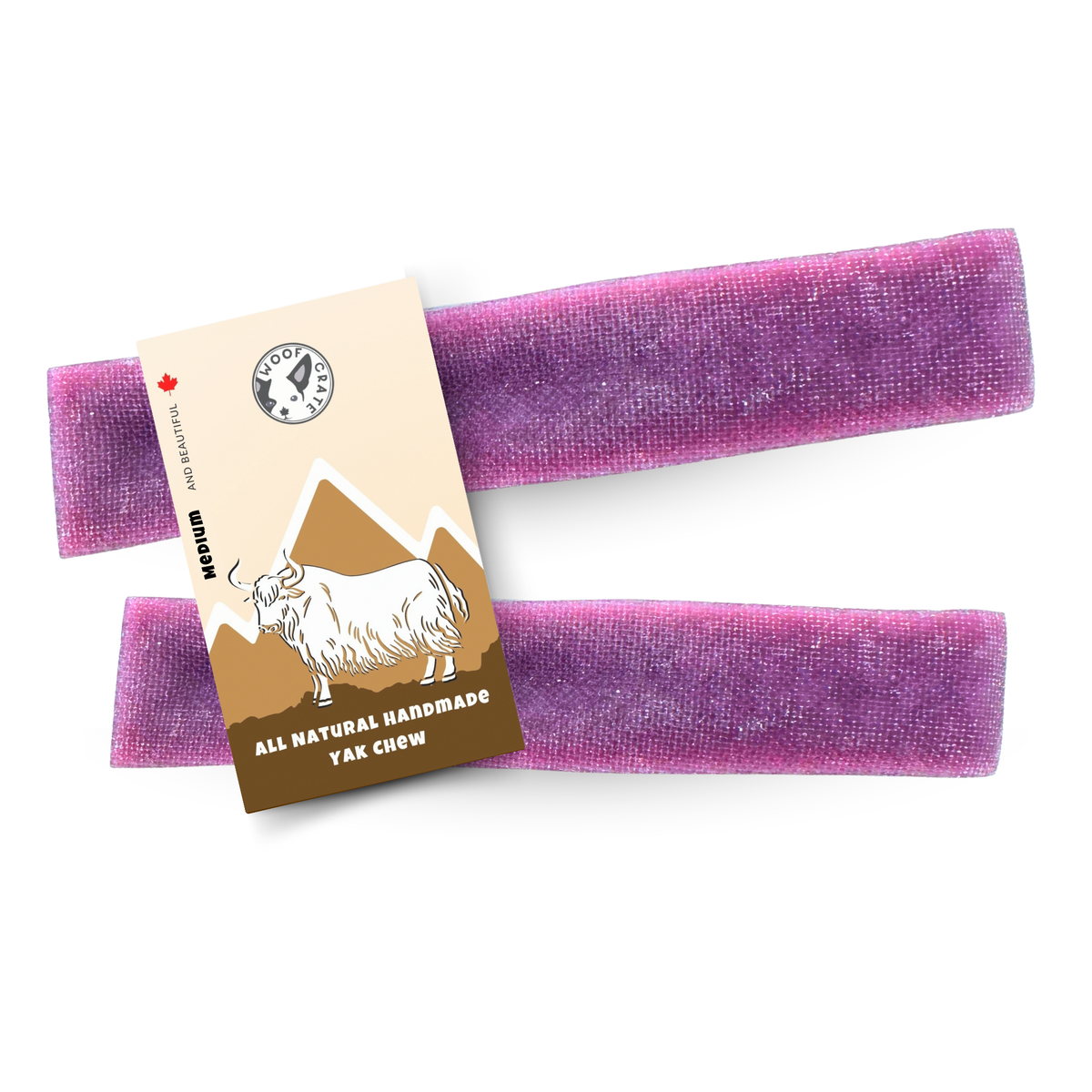 Two purple blueberry yak cheese dog chews with a WoofCrate Handmade Yak Chew tag on a white background
