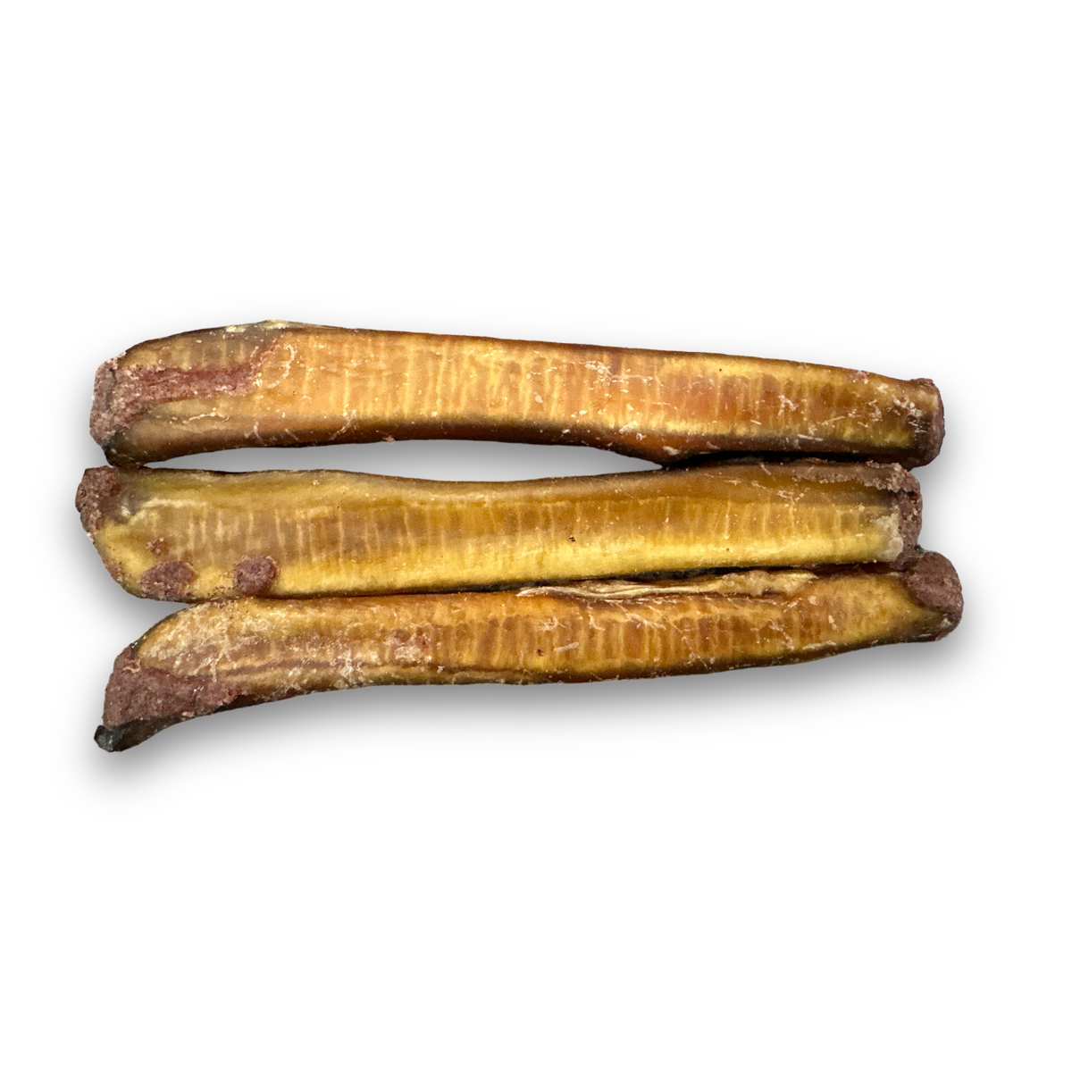 Three cranberry stuffed bully sticks lying side by side on a white background