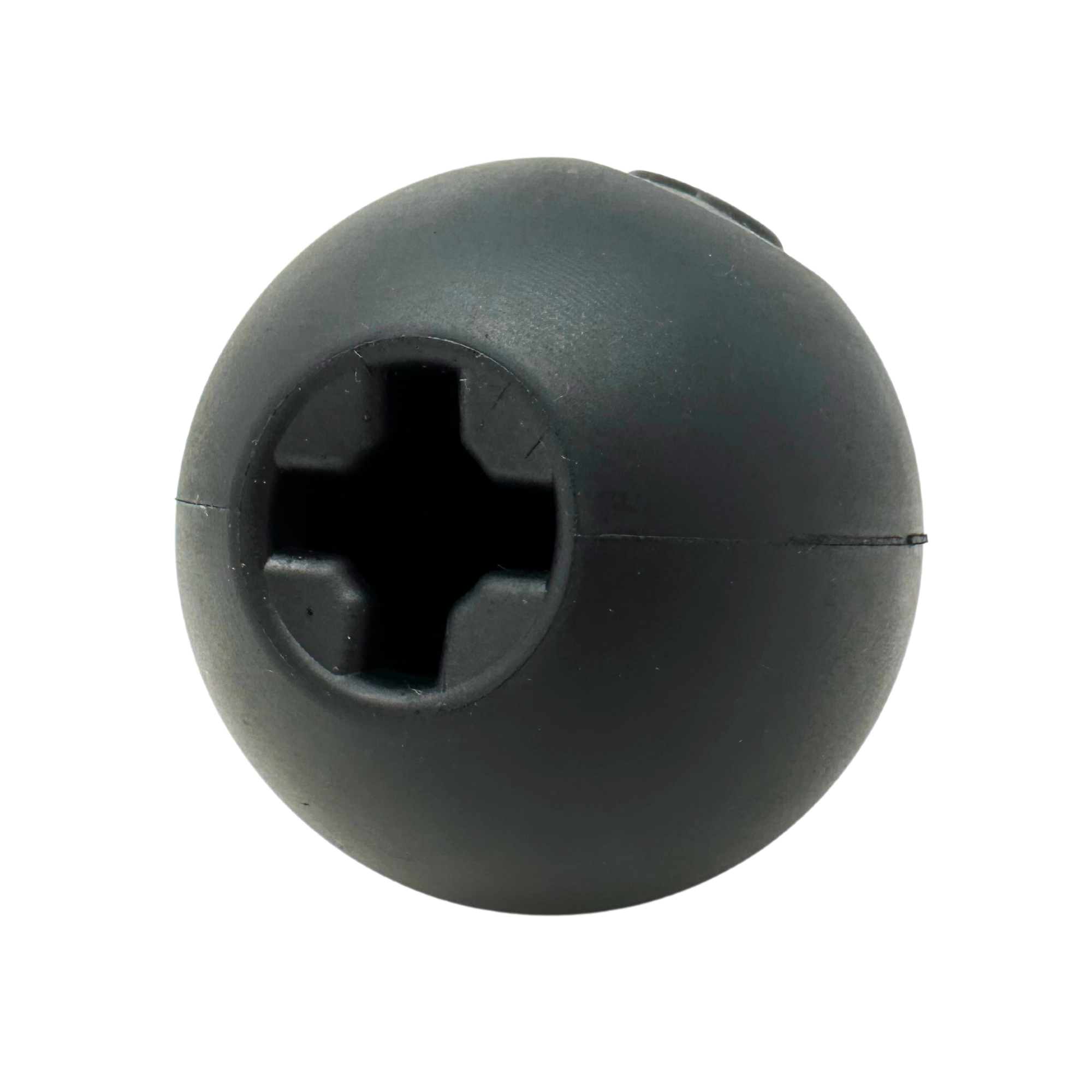 Black rubber treat-dispensing dog ball with cross-shaped opening