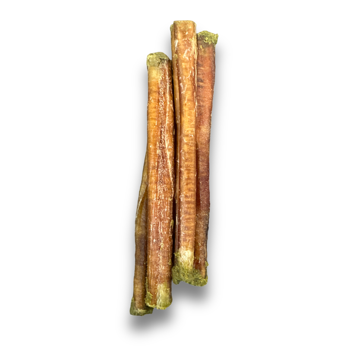 Thin bully sticks with green stuffed ends standing upright on a white background