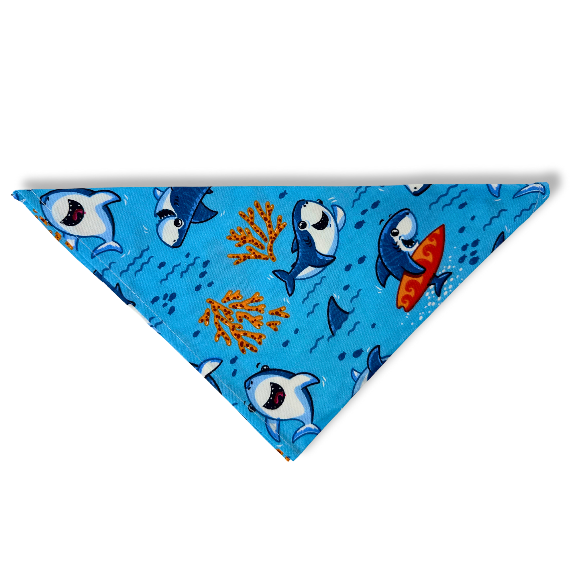 Triangle dog bandana with surfing shark and underwater coral print in blue and orange tones
