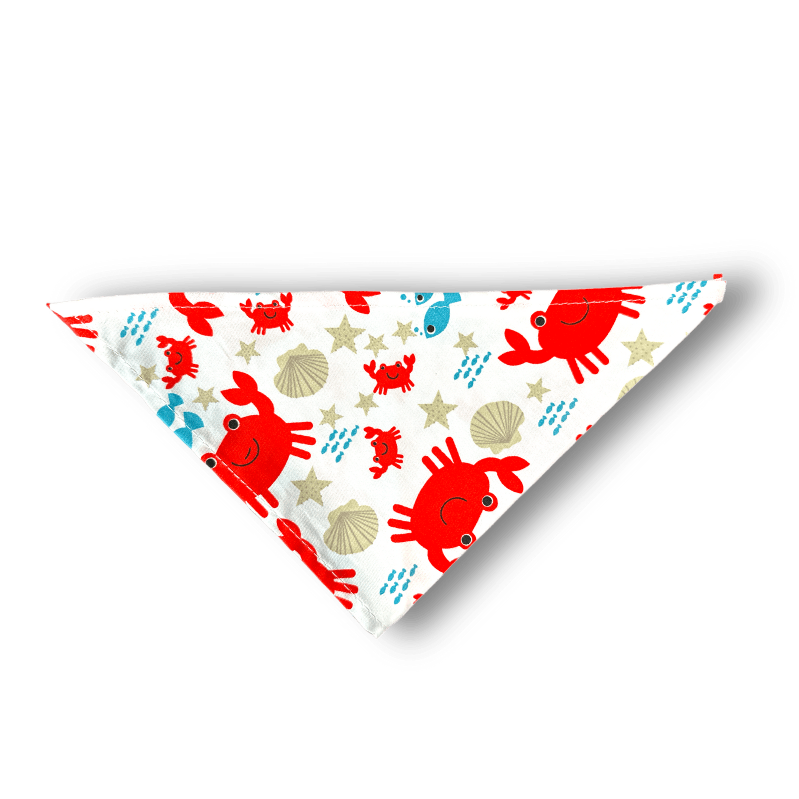 Beach themed dog bandana with images of crabs, shells and fish resembling the beach sand.