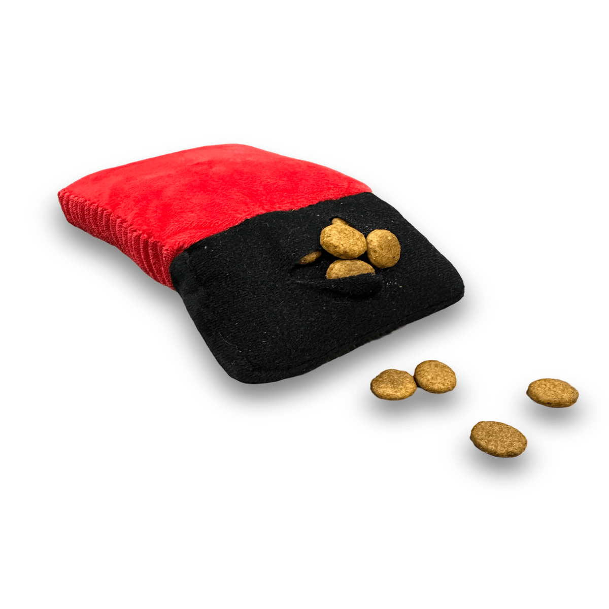 red calculator plush dog toy with a treat pocket filled with dog food.