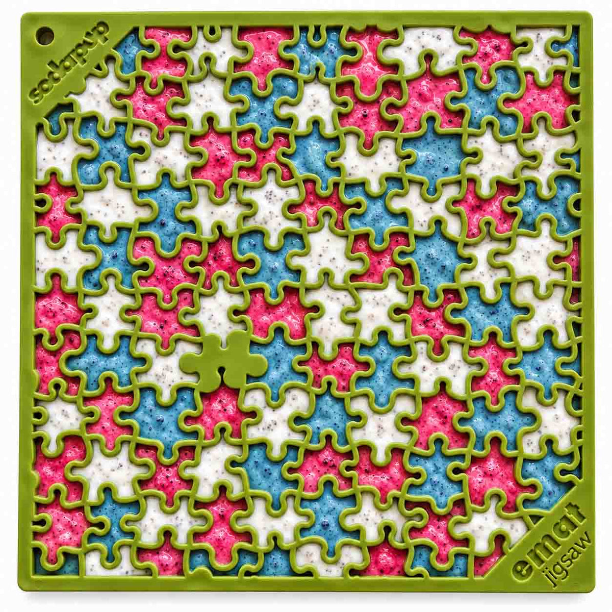 Green Jigsaw lick mat covered in colourful treats