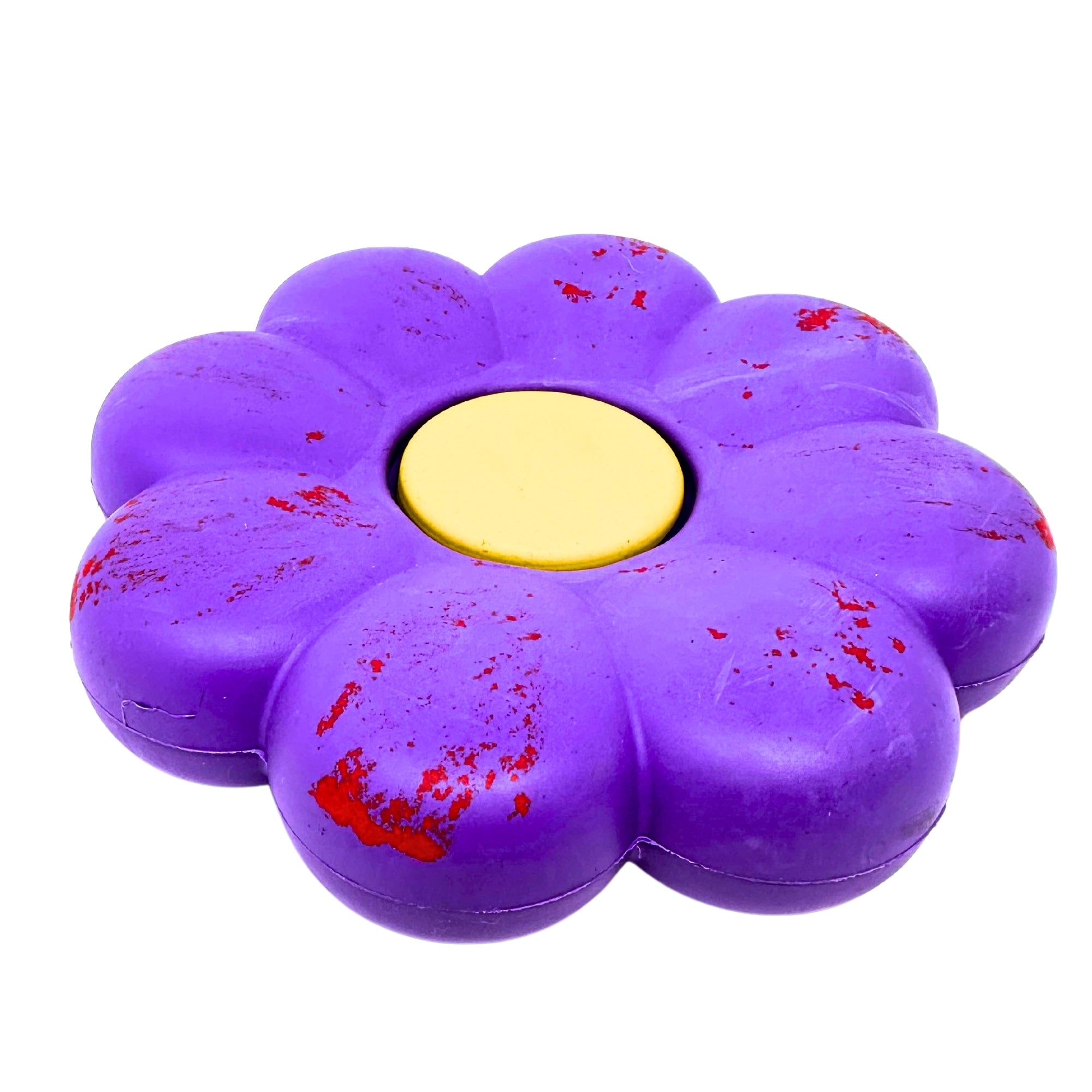 Dog toy shaped like a purple flower
