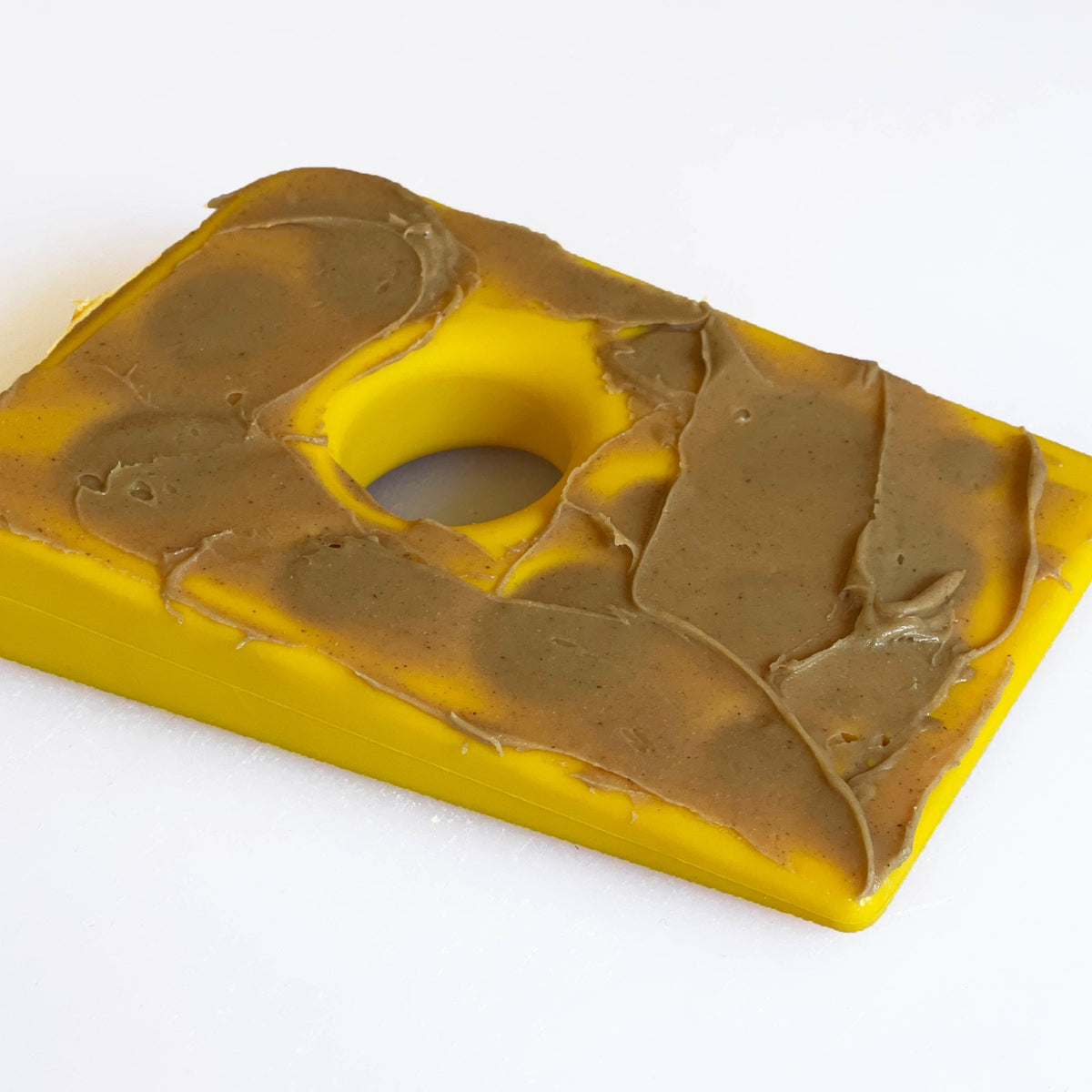 SodaPup Swiss Cheese nylon chew toy on a table