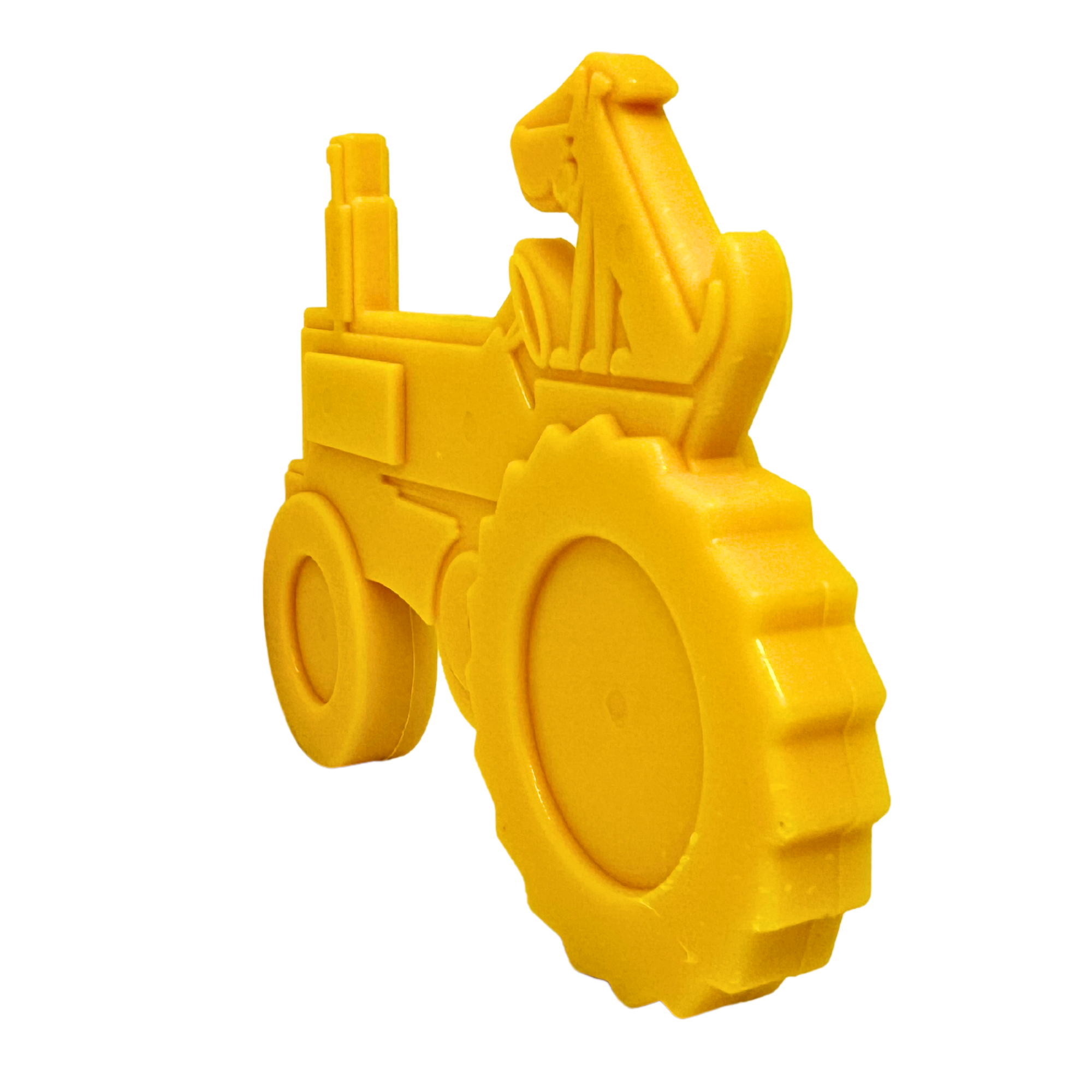 Yellow tractor-shaped dog toy with rugged wheels and a cartoon dog in the driver’s seat